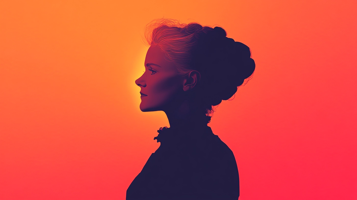 Silhouette portrait of a woman © History Oasis Silhouette of a woman with an upswept Victorian hairstyle on orange gradient