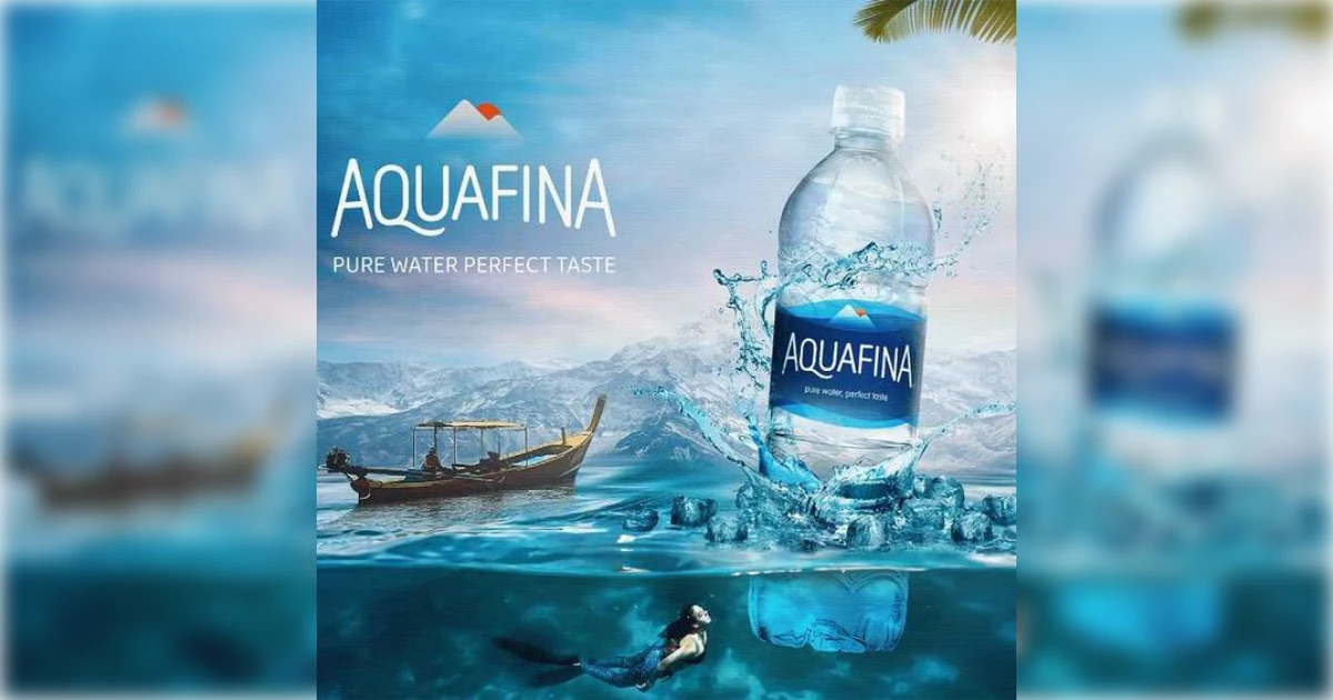 Aquafina Aquafina bottle ad with water splash over a tropical ocean