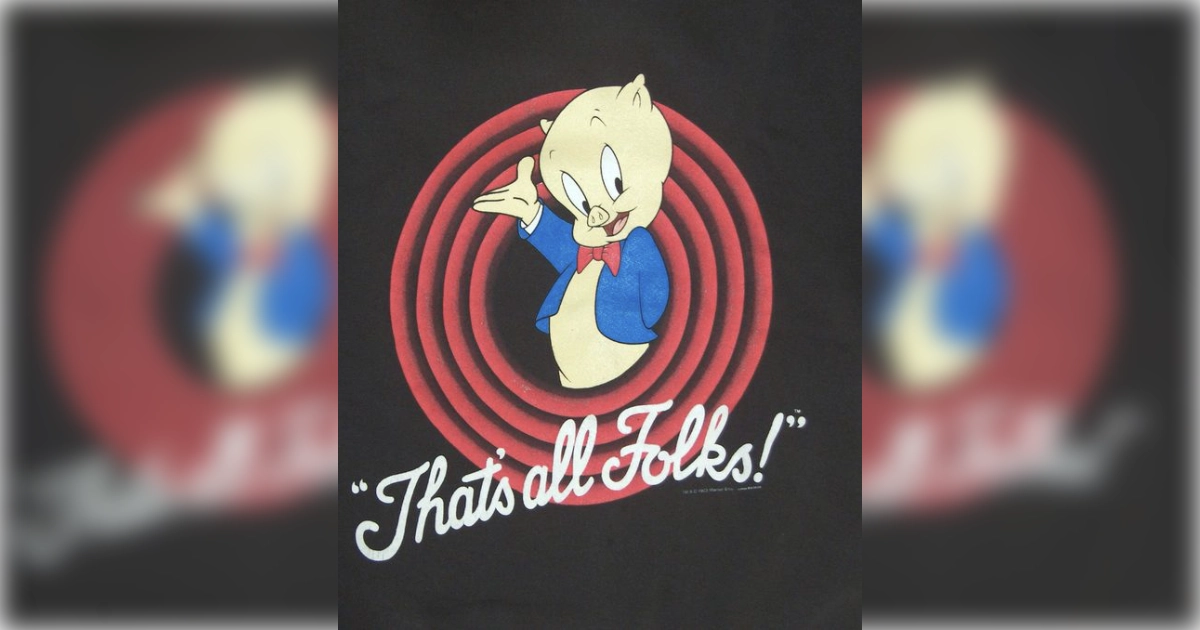 Looney Tunes Porky Pig in his blue jacket and red bow tie over the That's All Folks! rings