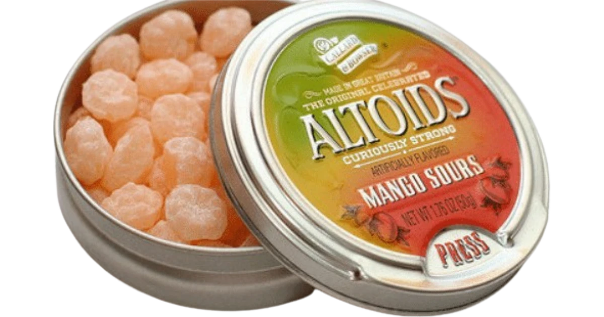 Altoids Open Altoids Mango Sours tin filled with orange candies