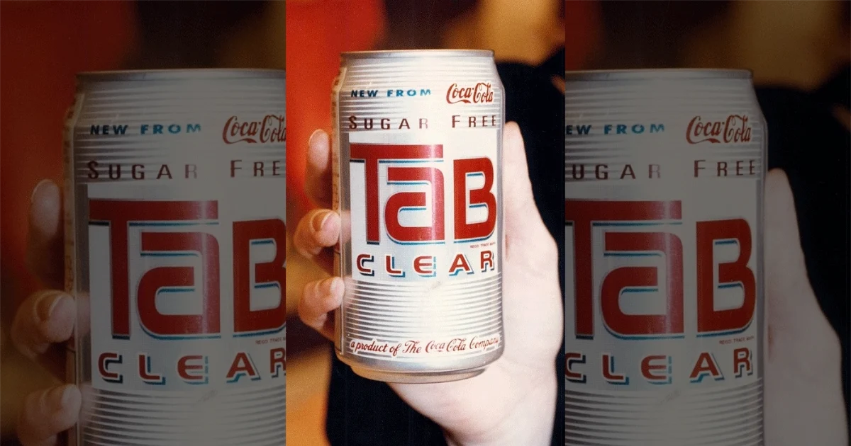 Hand holding a sugar free TaB Clear can