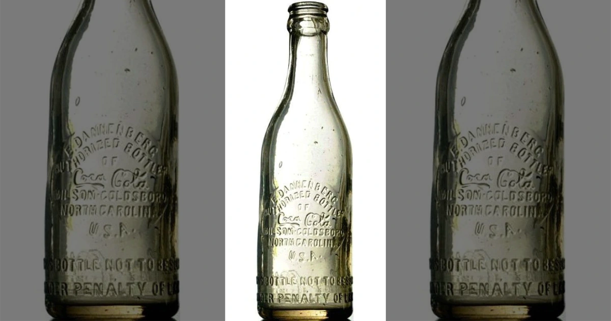 Wikipedia Early straight-sided Coca-Cola glass bottle with embossed script lettering