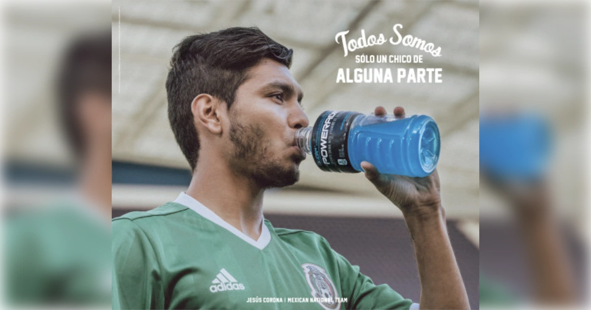 The Coca-Cola Company Mexican national team footballer drinking from a blue Powerade bottle