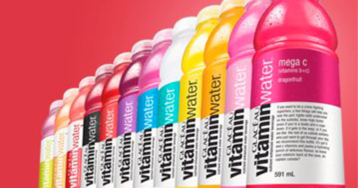 The Coca-Cola Company Row of Glacéau vitaminwater bottles led by mega c dragonfruit