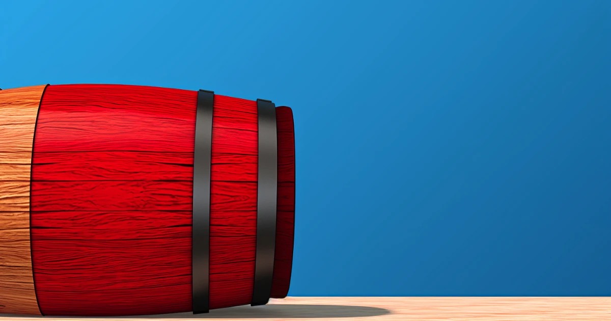 Red barrel © History Oasis Bright red wooden barrel with black metal hoops on a blue background