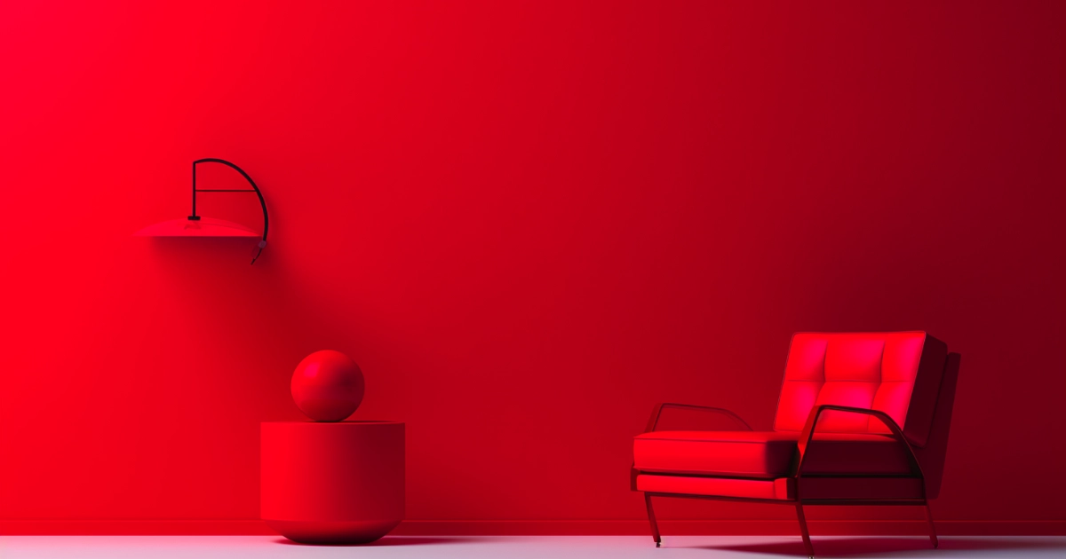 Red room © History Oasis All-red room with a red armchair, lamp, and side table
