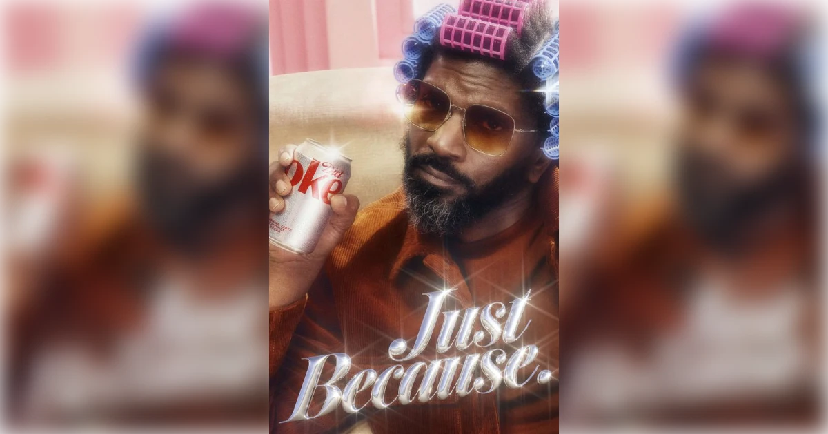 Just Because Diet Coke ad with man in hair rollers and sunglasses