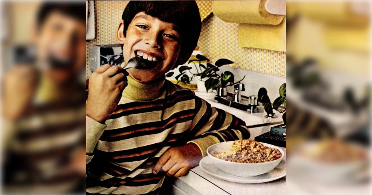 Vintage Quaker Oats ad, smiling boy eating a bowl of oatmeal