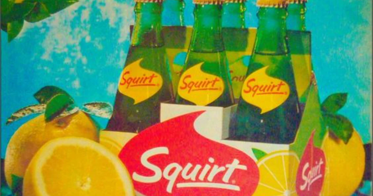 Squirt Vintage Squirt ad with a six-pack of bottles and fresh grapefruits