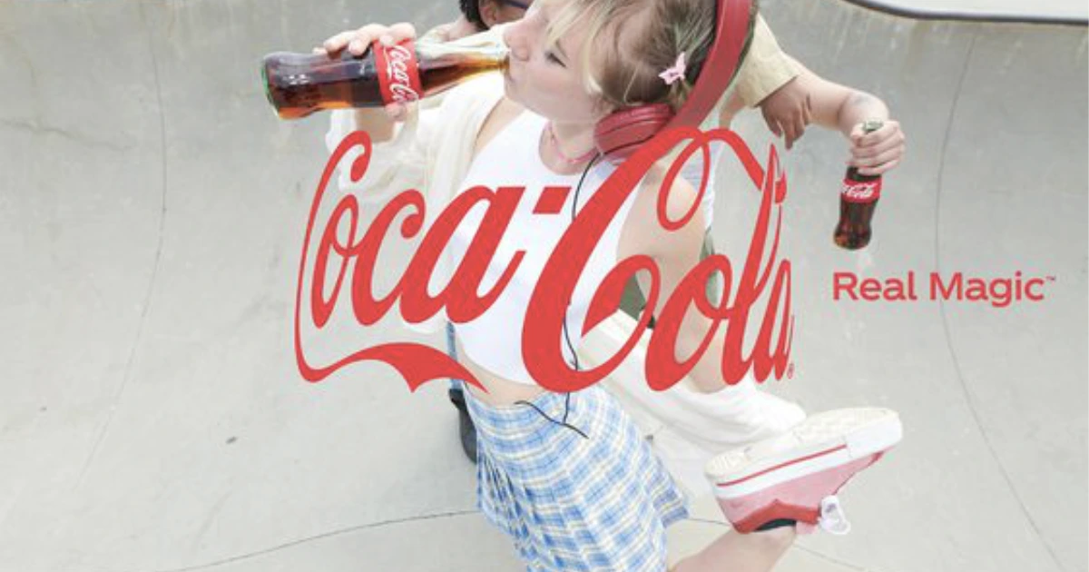 The Coca-Cola Company girl with red headphones drinking Coca-Cola at a skatepark in Real Magic ad