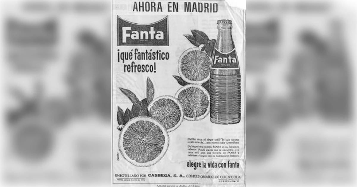 Spanish Fanta newspaper ad with orange slices and glass bottle