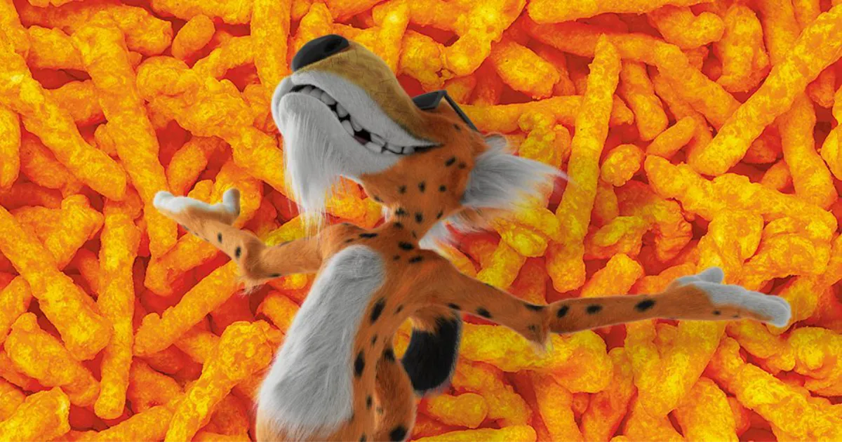 Cheetos Chester Cheetah lying on a pile of Cheetos crunchy cheese puffs