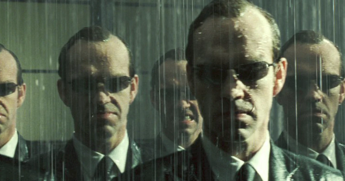 Agent Smith copies in sunglasses behind rain-streaked glass, The Matrix