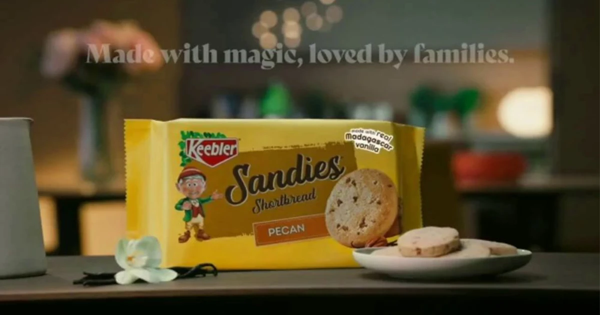 Sandies Pecan Shortbread in a recent Keebler commercial—the tagline reads “Made with magic, loved by families” — Keebler Keebler Sandies Pecan Shortbread package in a current Keebler television commercial