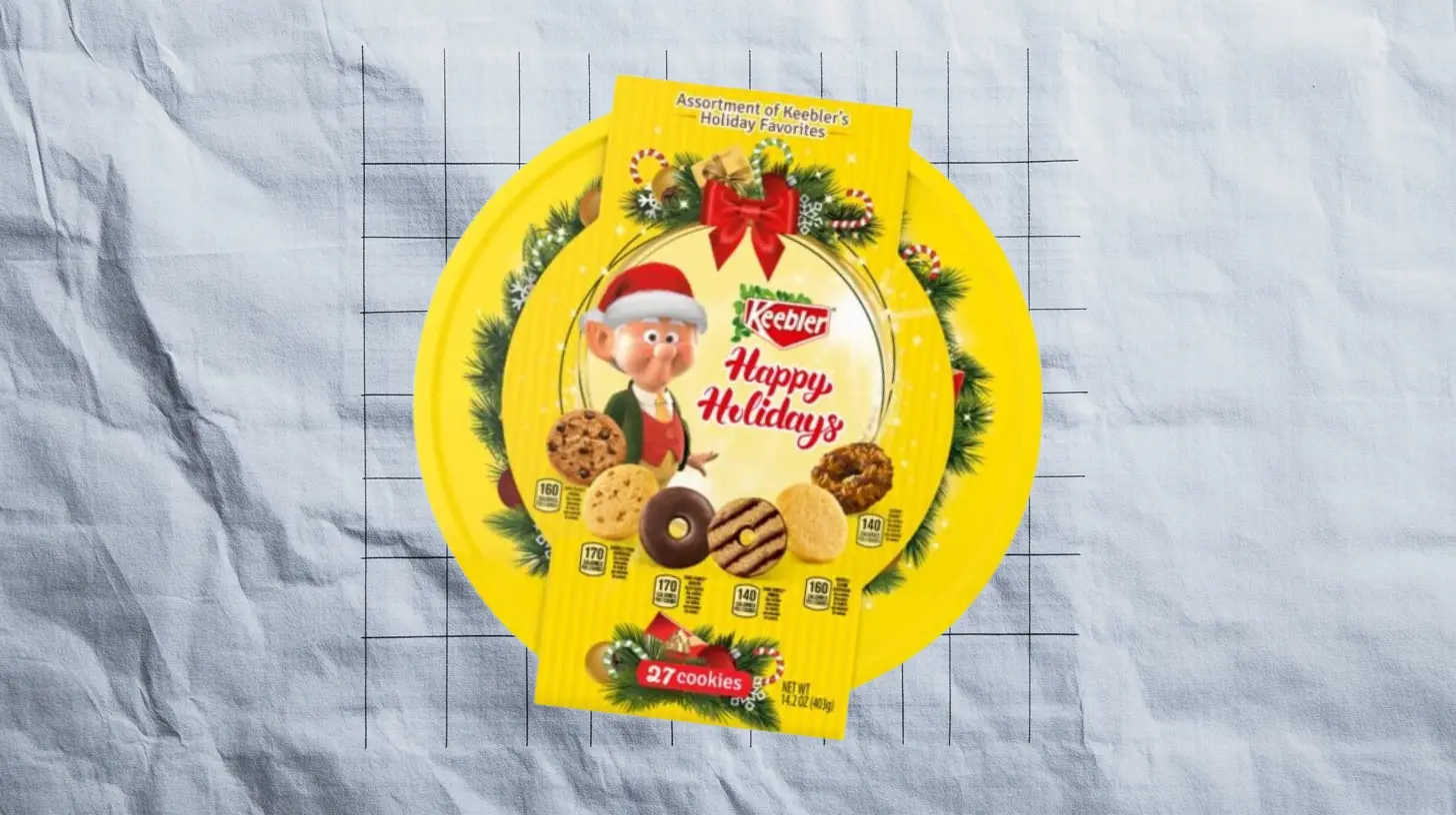Keebler still sells Happy Holidays assortment trays—but the seasonal shelf they occupy once belonged to Jingles — Keebler Keebler Happy Holidays 27-cookie assortment tray with Ernie the Elf in a Santa hat