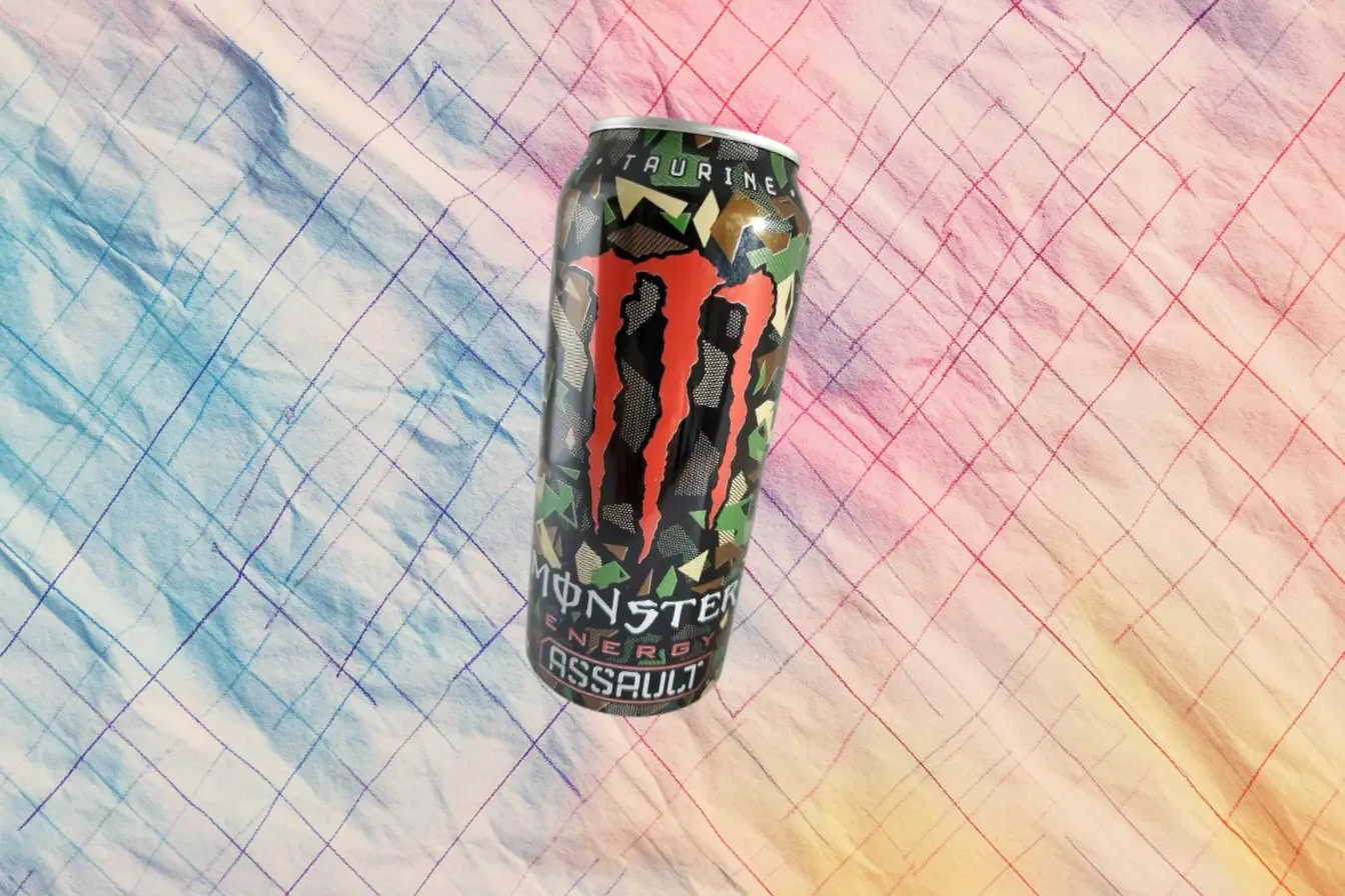 Monster Energy Assault can with green camo print and red claw logo