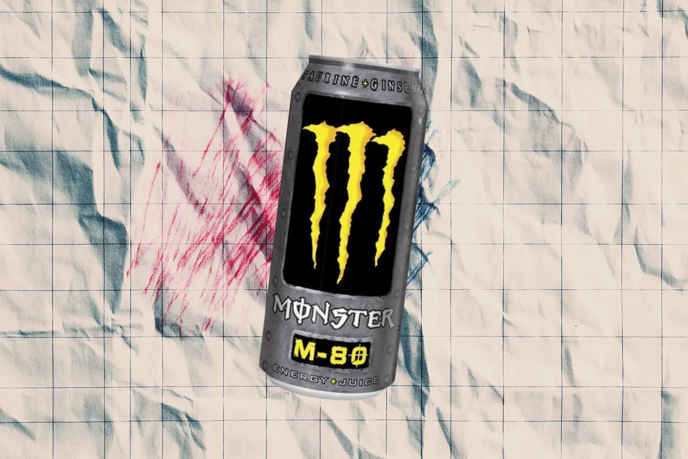 The silver Monster M-80 Energy + Juice can — Monster Energy Discontinued Monster M-80 Energy plus Juice can in silver with yellow claw