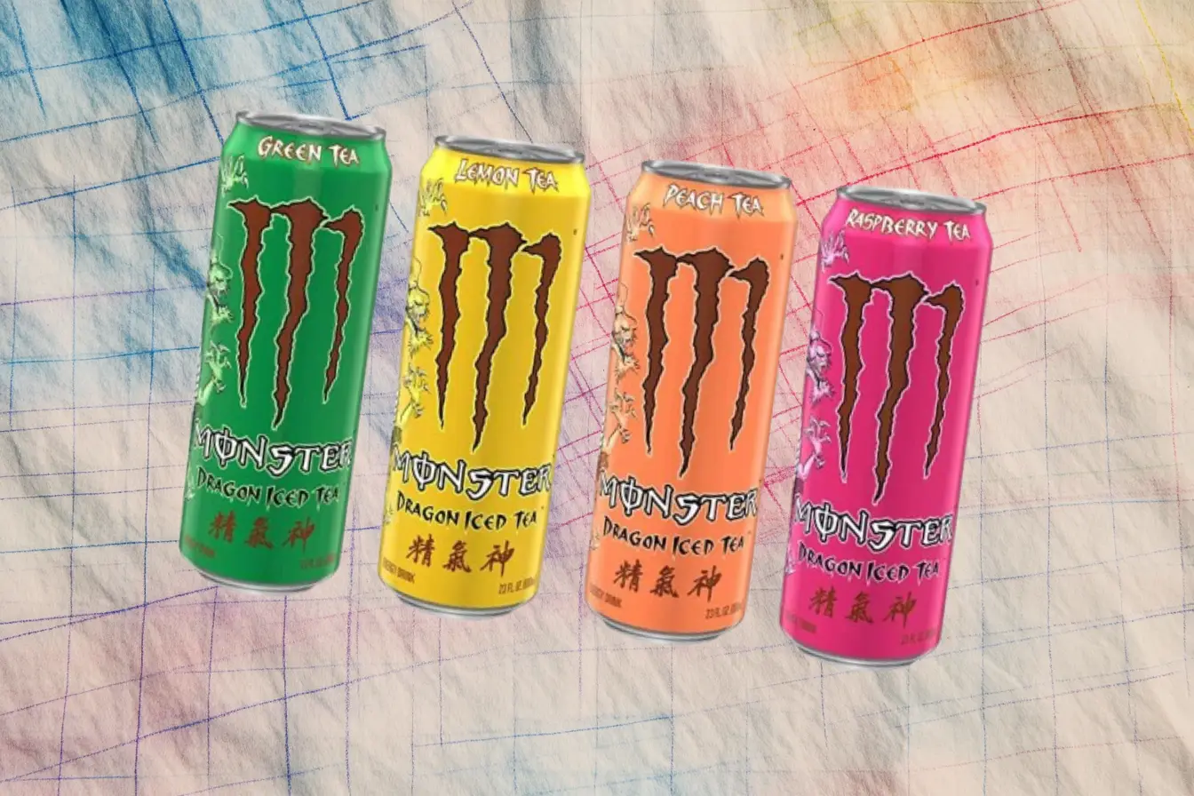The Dragon Iced Tea lineup: green tea, lemon, peach, and raspberry — Monster Energy Four discontinued Monster Dragon Iced Tea cans in green tea, lemon, peach, and raspberry