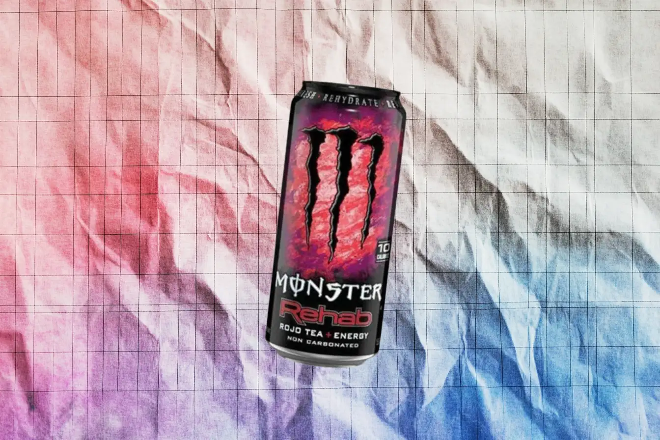 The red-purple Monster Rehab Rojo Tea can, marked non-carbonated — Monster Energy Purple Monster Rehab Rojo Tea non-carbonated energy can