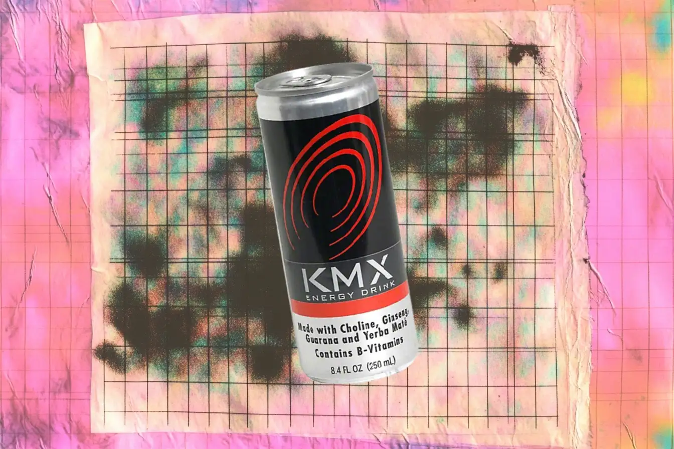KMX Energy Drink slim black can with red spiral graphic