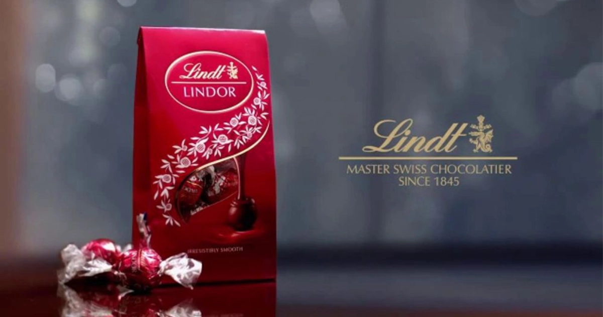 Lindt & Sprungli Red Lindt Lindor truffles bag with wrapped chocolate truffles