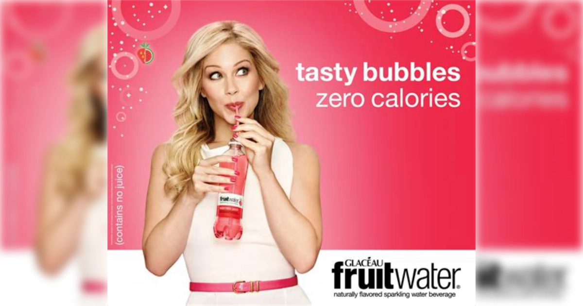 The Coca-Cola Company Glaceau Fruitwater ad, woman sipping a pink sparkling water bottle