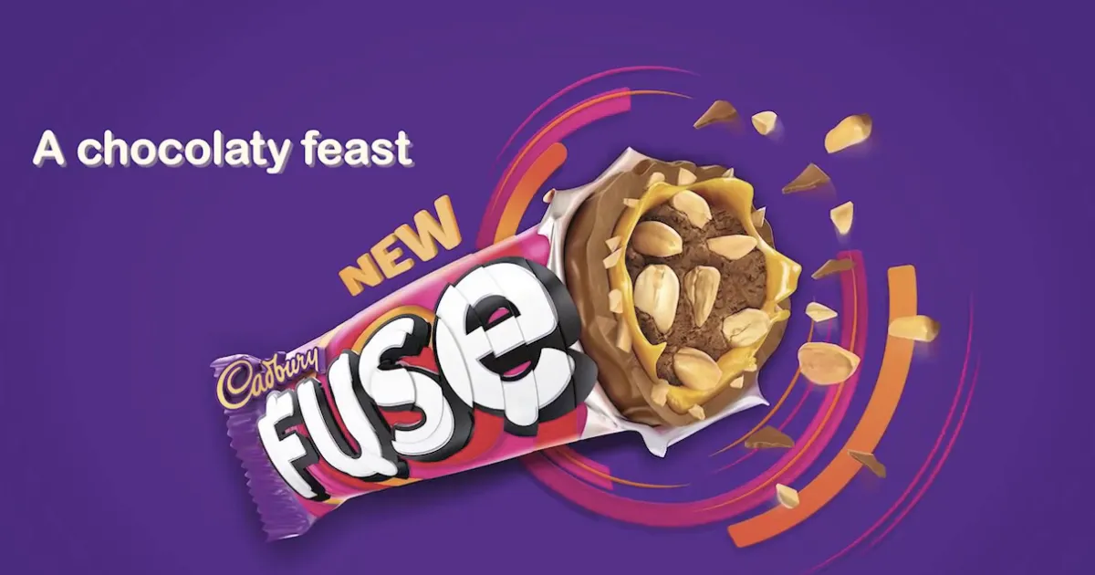 Cadbury Fuse bar advert showing peanut-filled chocolate centre on purple