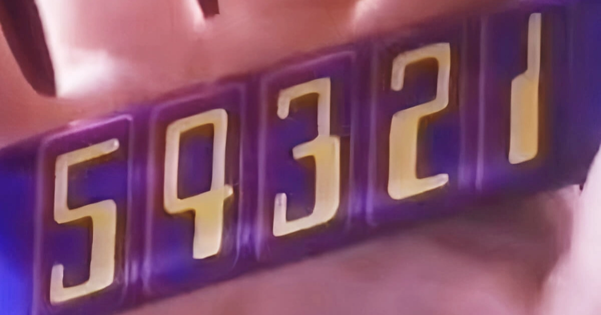 Crawford's Blurry close-up of the numerals 54321 on a purple wrapper