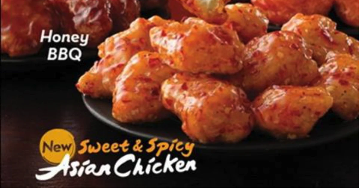 Wendy's Wendy's Sweet & Spicy Asian boneless wings ad, sauced chicken on plate