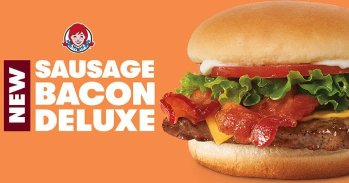 Wendy's Wendy's Sausage Bacon Deluxe ad showing bacon cheeseburger with lettuce and tomato