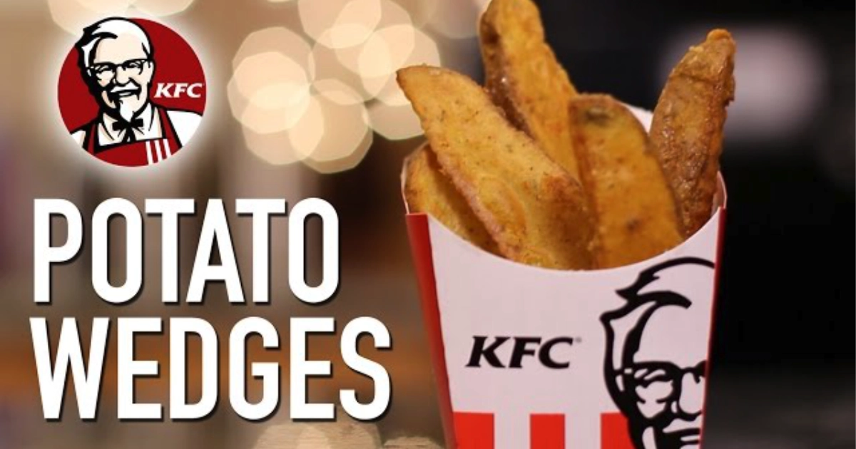 KFC carton of potato wedges beside the Colonel Sanders logo