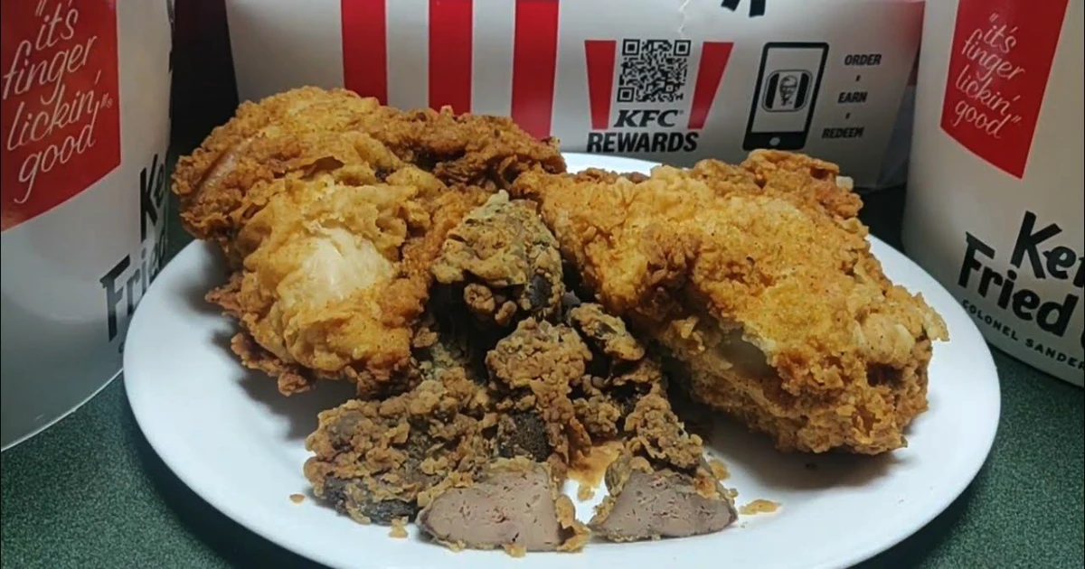 Plate of fried chicken livers beside KFC fried chicken pieces