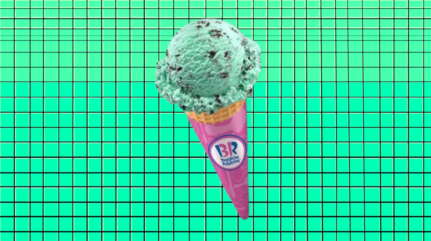 Baskin-Robbins Mint chocolate chip scoop on a pink Baskin-Robbins cone