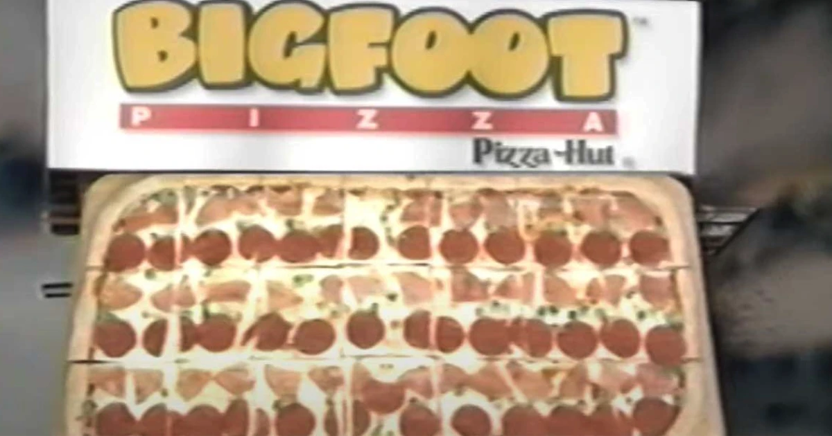 Pizza Hut Pizza Hut Bigfoot Pizza rectangular pepperoni and ham pie under logo sign