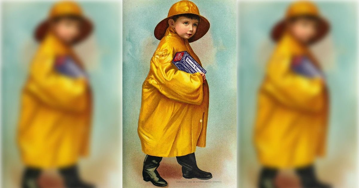 Uneeda Biscuit boy in yellow rain slicker holding a Nabisco box