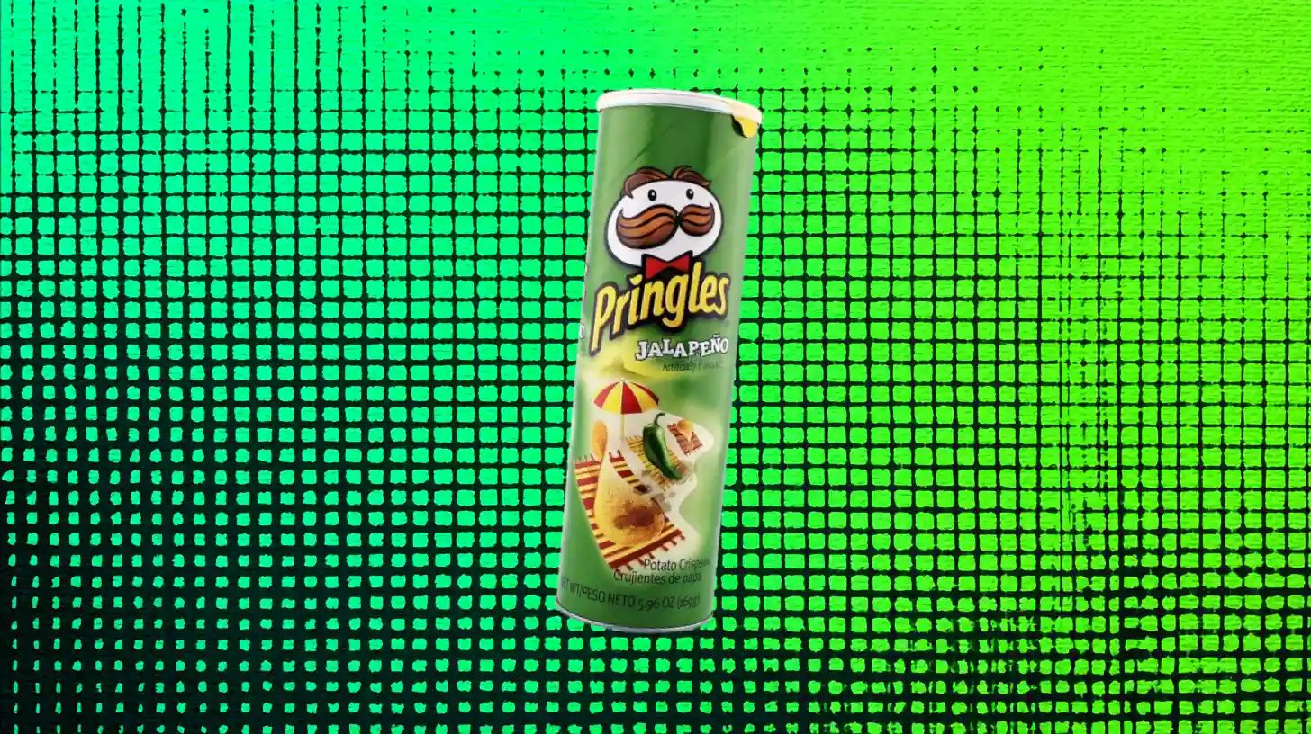Kellanova Green Pringles Jalapeno can with sliced jalapeno pepper on green grid