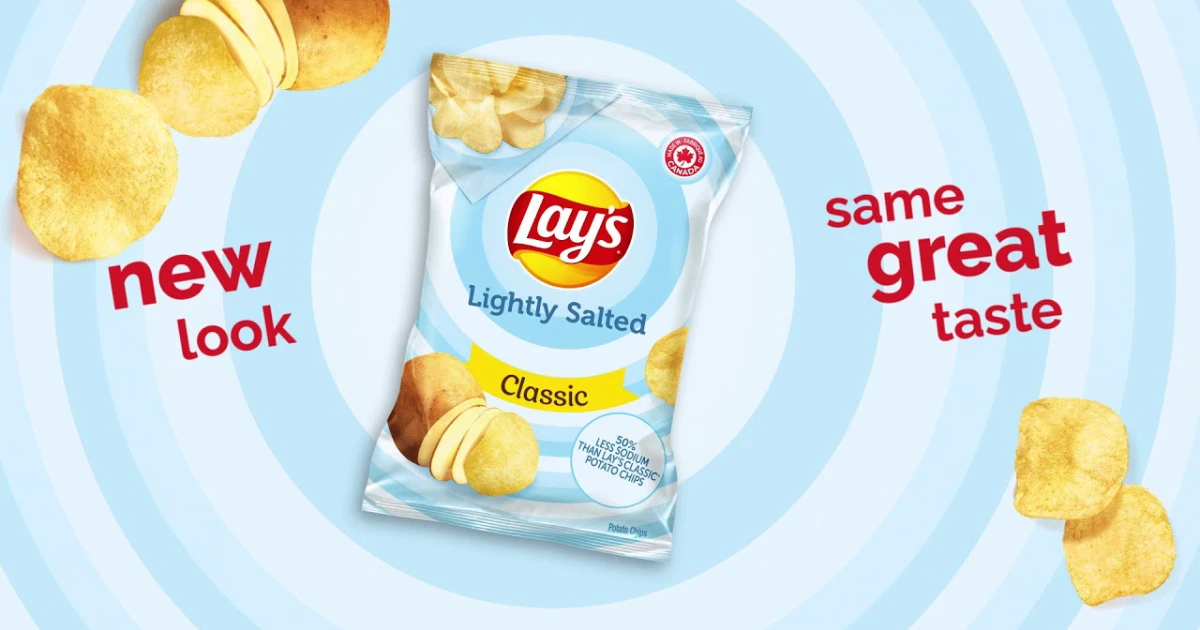 Lay’s Lightly Salted Classic potato chips bag with scattered chips