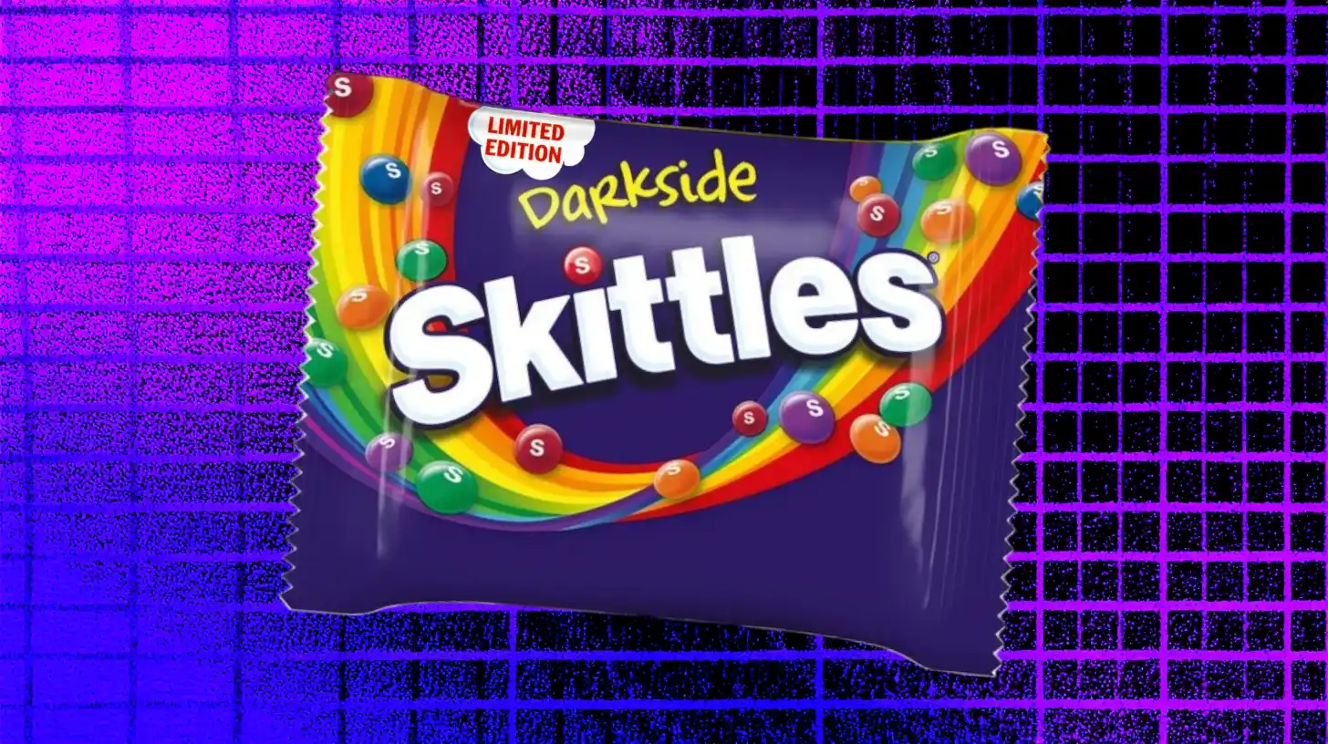 Mars, Inc Limited edition Skittles Darkside purple candy bag with rainbow graphic