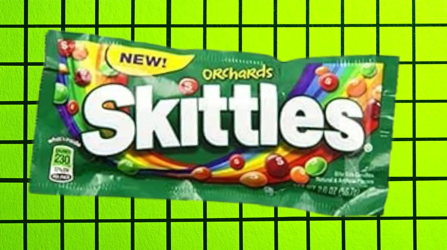 Mars, Inc Skittles Orchards green candy bag marked New with rainbow of candies