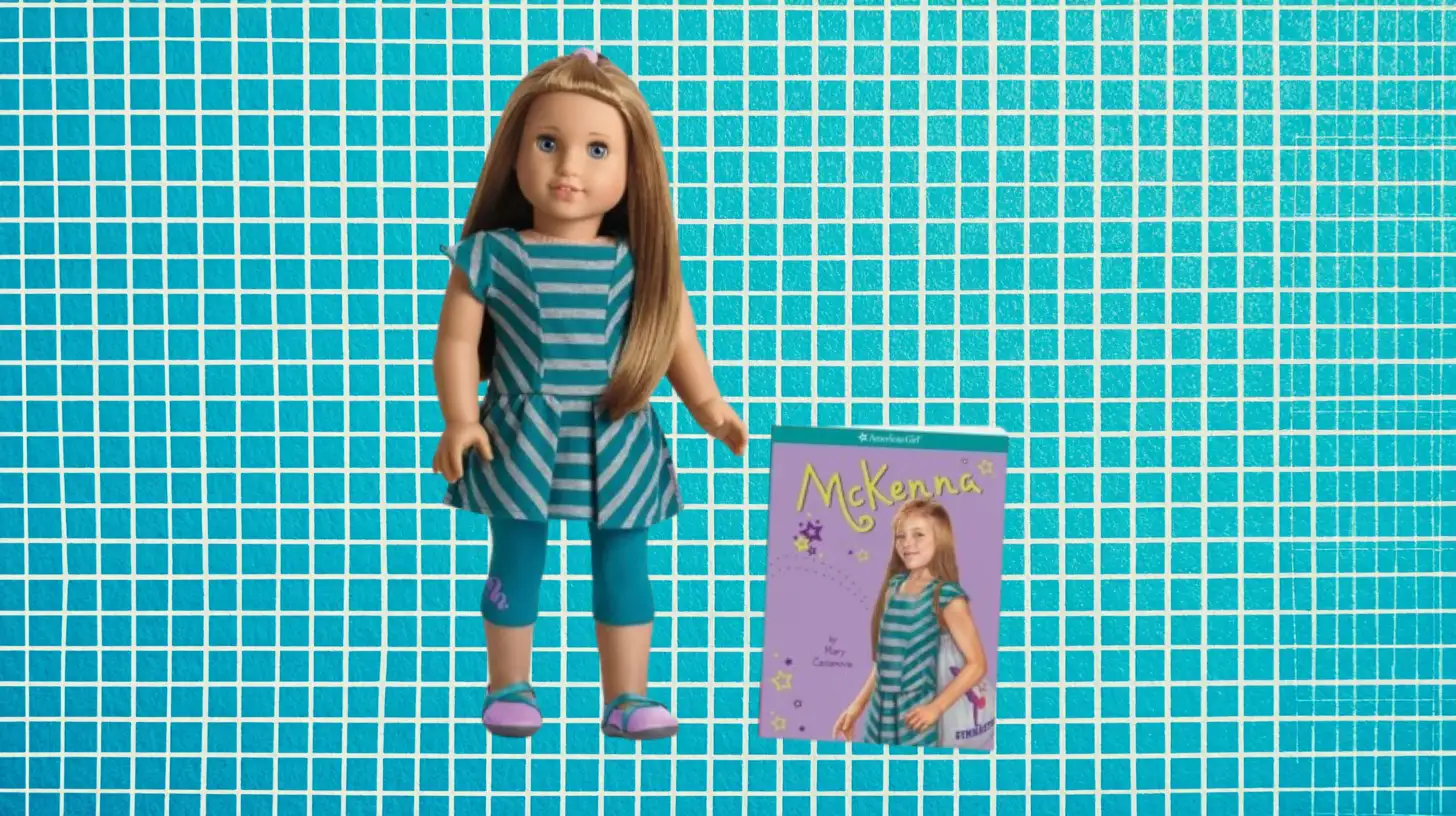 Mattel McKenna Brooks American Girl doll in teal striped outfit with book