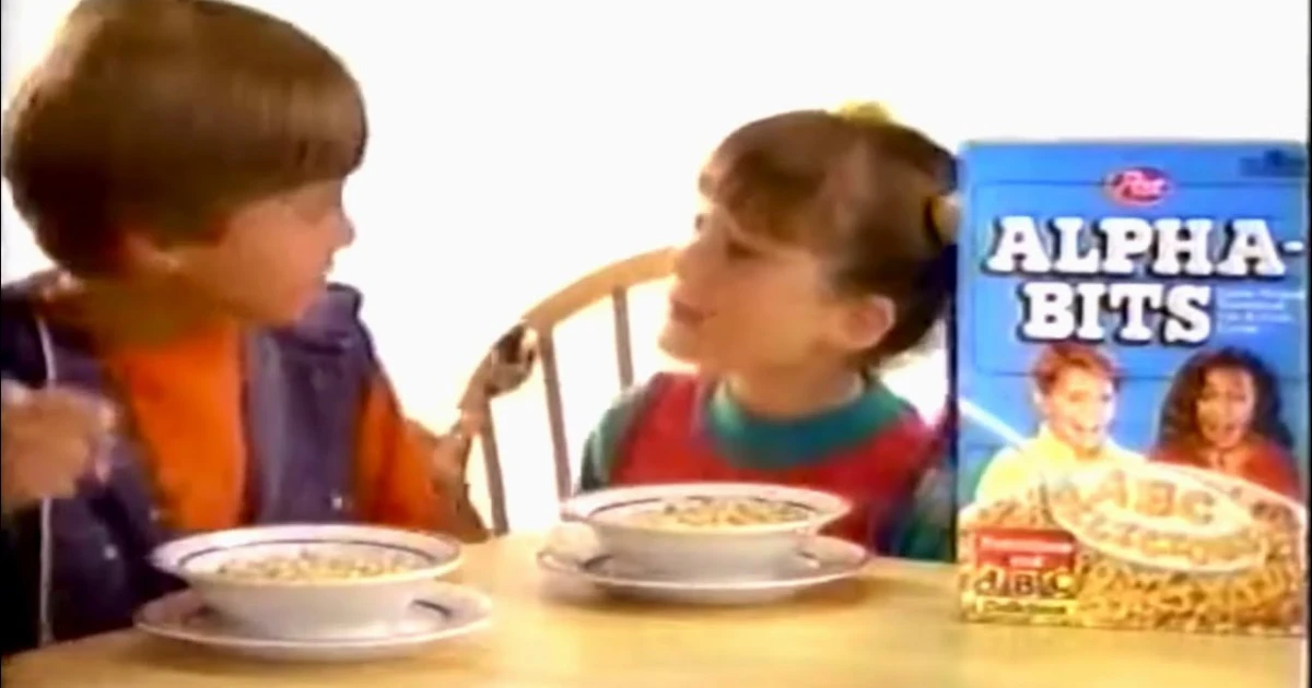 Post Two children eating cereal beside a Post Alpha-Bits box