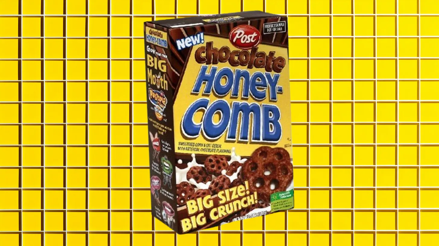 Post Post Chocolate Honeycomb cereal box on a yellow grid background