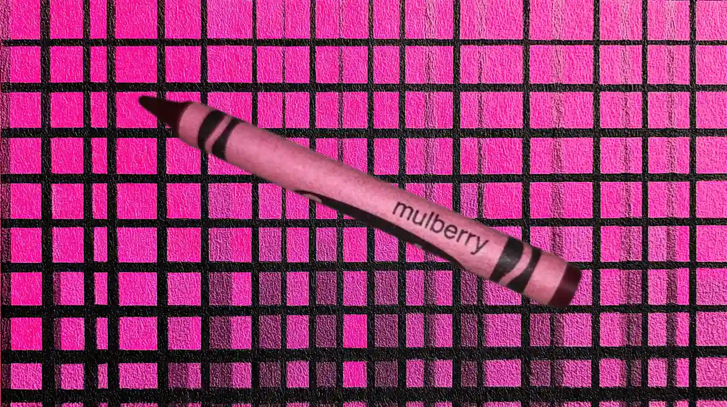 Crayola Mulberry crayon with dusty pink wrapper and dark purple tip