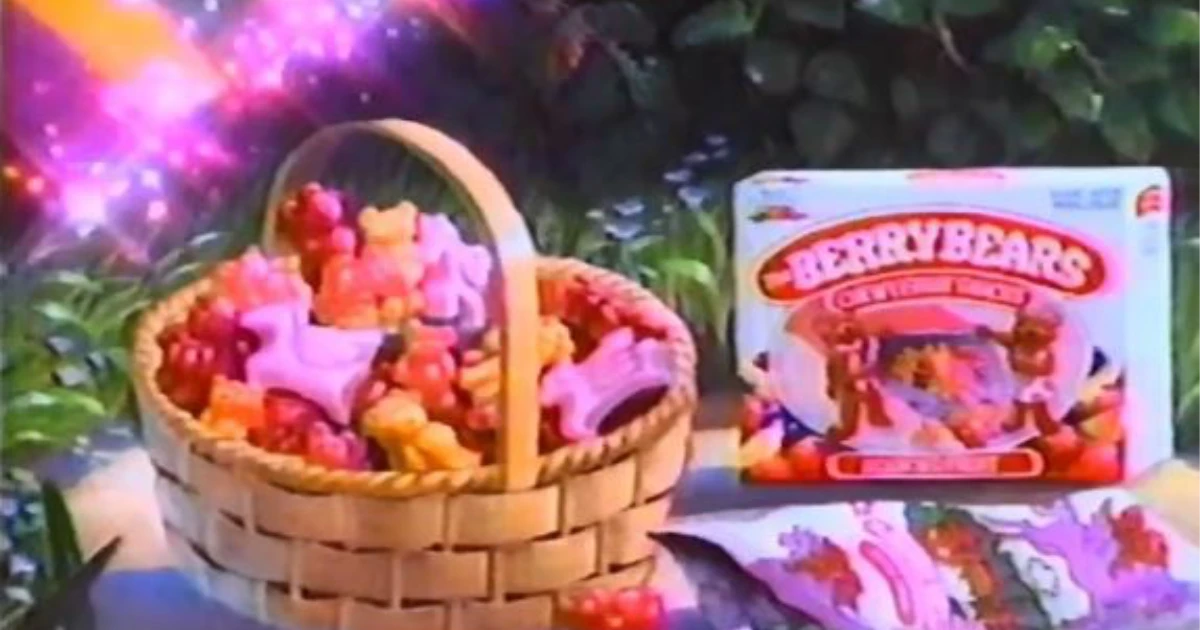 Berry Bears Berry Bears fruit snacks box beside a basket of bear-shaped gummies