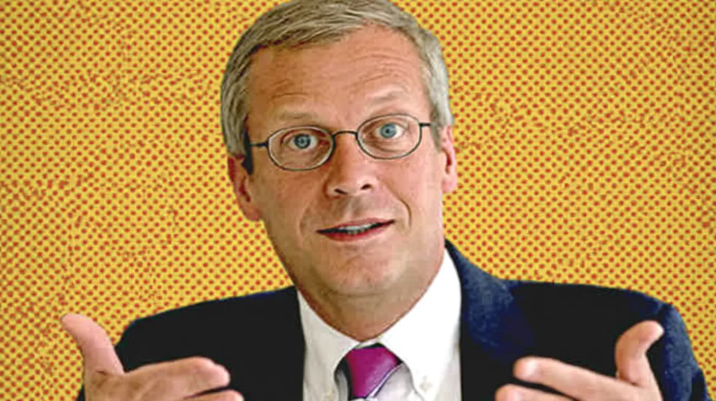 Executive gesturing in a suit © History Oasis Man in round glasses gesturing against a yellow dotted background