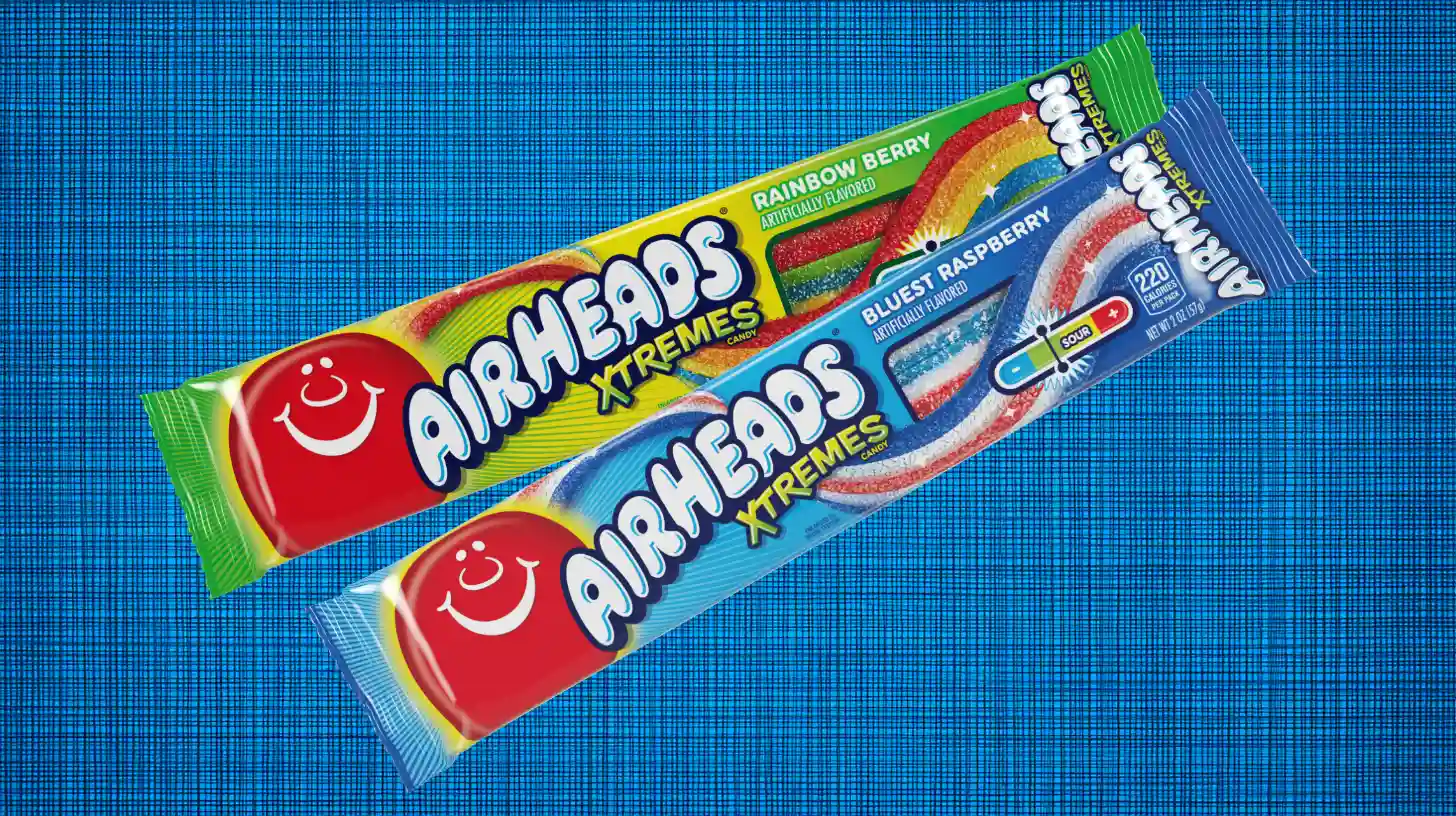Airheads Xtremes Rainbow Berry and Bluest Raspberry sour belt packages