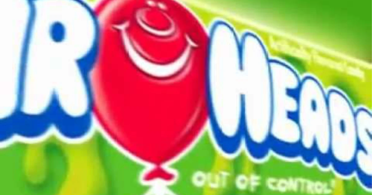 Close-up of a green Airheads wrapper with Out of Control slogan