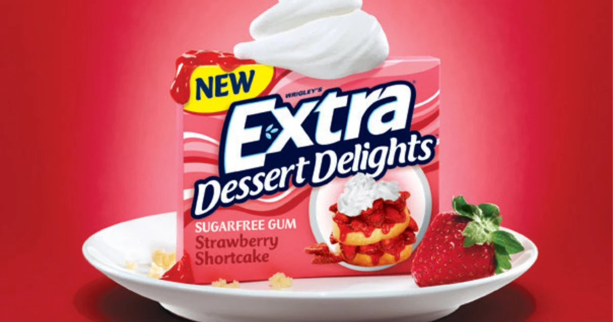 Wrigley's Extra Dessert Delights Strawberry Shortcake gum pack on plate with strawberry