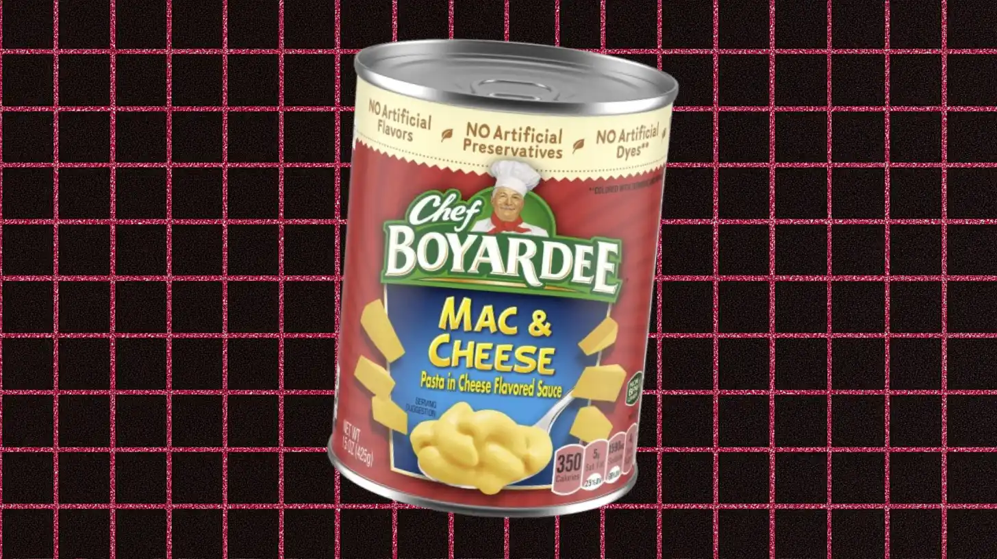 Hometown Foods Chef Boyardee Mac and Cheese can on a pink grid background