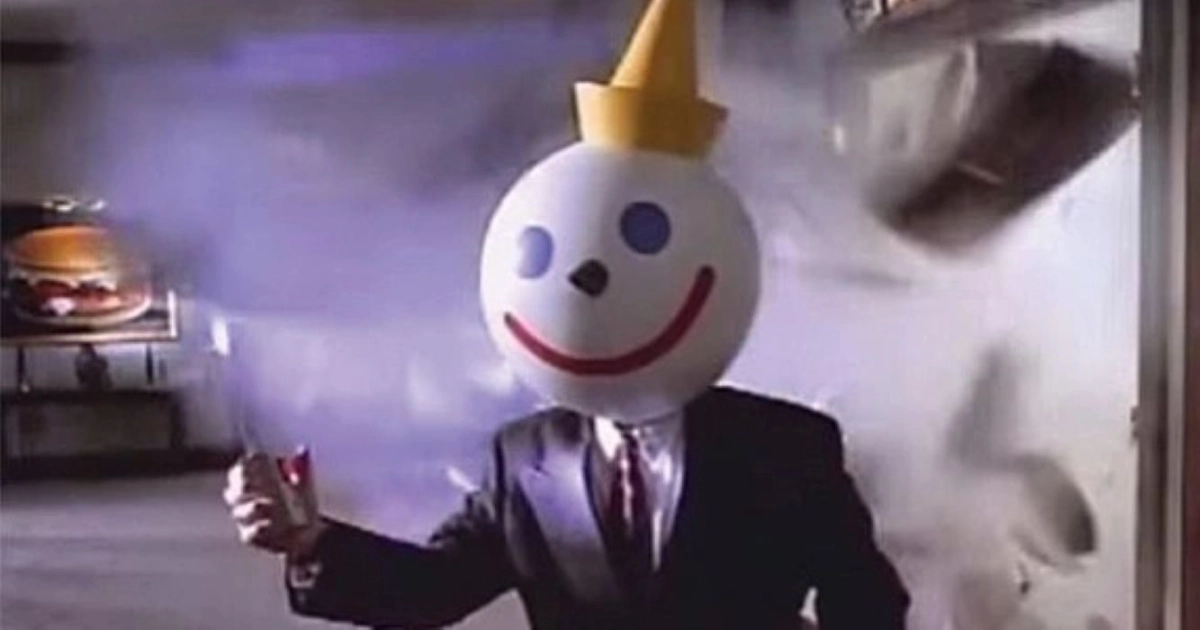 Jack Box returning in the 1994 “Jack's Back” campaign — Jack in the Box Jack Box, the Jack in the Box mascot, in a suit and round white clown head walking from an explosion